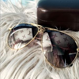 Louis Vuitton aviators with small scratch